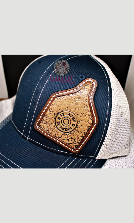 HAT WITH HAND TOOLED LEATHER PATCH